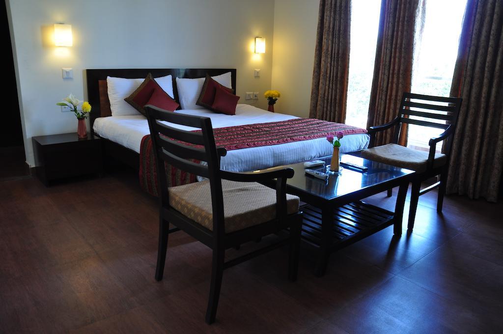 Golden Palm Suites Delhi  Habitación foto